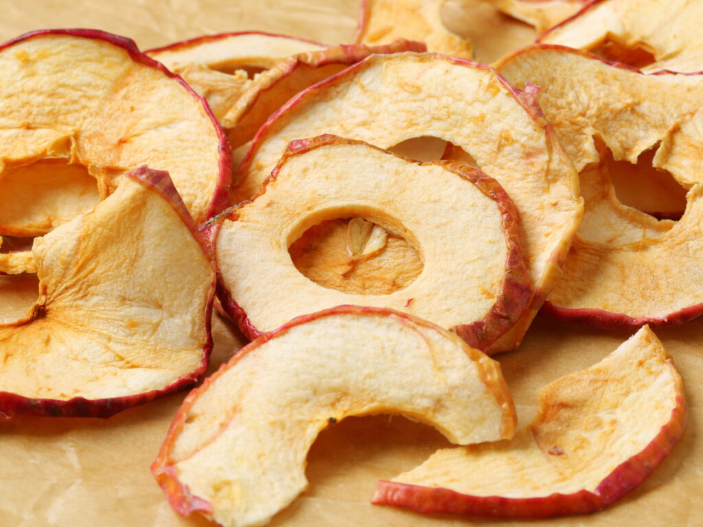 apple chips on baking parchment paper